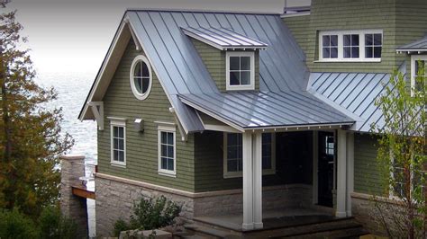 white exterior house with green metal roof|green roof colors.